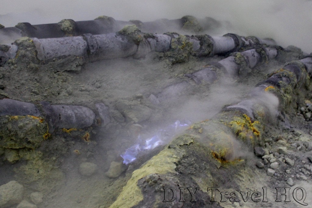 Volcanic gases produce blue flames & sulphur