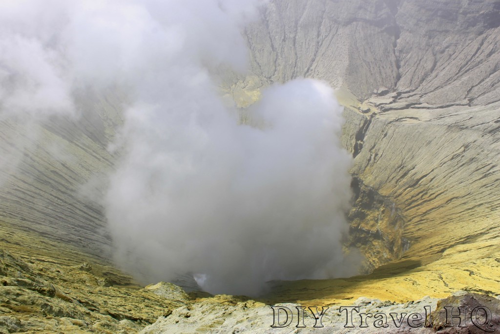 White smoke erupting from Mount Bromo crater