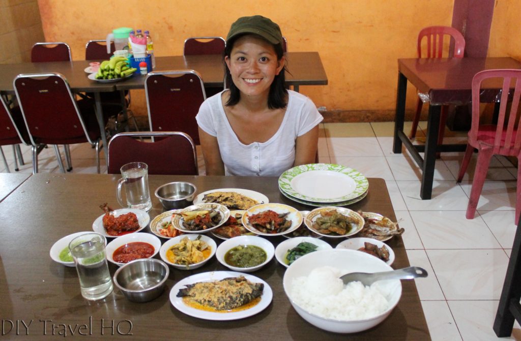 Tourist eating padang food Bukittinggi