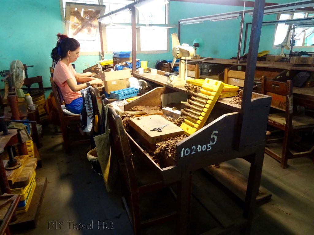 Cigar factory worker at her desk